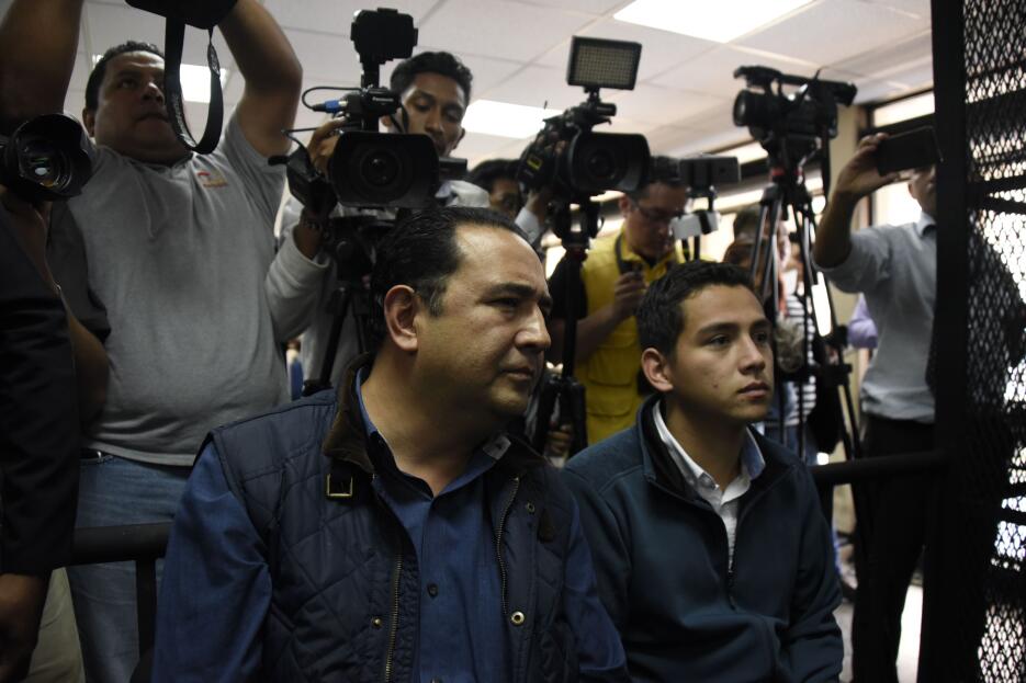 El hijo del presidente, José Manuel Morales (D), y su tío, Sammy Morales...